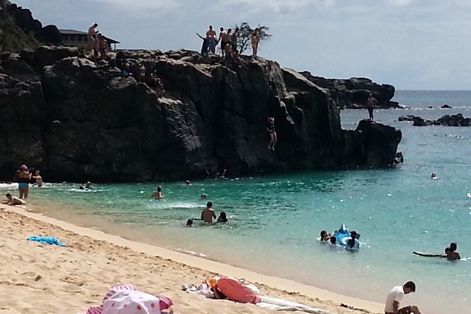 8-Hour Luxury Four Door Convertible Tour of Oahu's South and North Shores - Waimea Bay and Waimea Waterfall: the best chance to feel the ocean up close