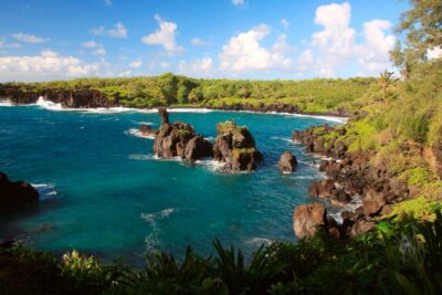 Central Maui: Two-Island Scenic Helicopter Flight to Molokai - From Maui to Molokai: sea cliffs and waterfall power