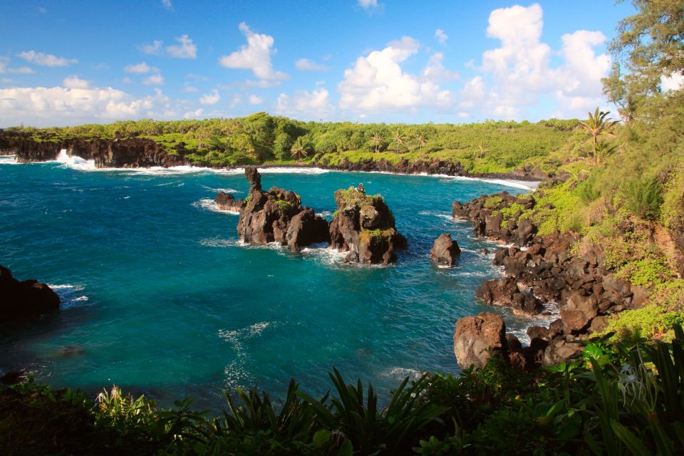 Central Maui: Two-Island Scenic Helicopter Flight to Molokai - From Maui to Molokai: sea cliffs and waterfall power