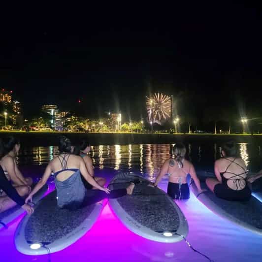 Honolulu: Fireworks Glow and Flow Yoga Class - LED Lights on SUP Boards: What the Glow Actually Feels Like