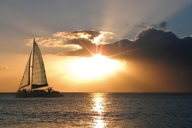 Maui: Ma'alaea Catamaran Sunset Sail with Appetizers - The onboard layout: open deck, trampoline, and covered seating