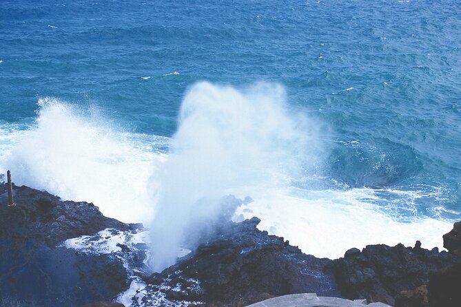 Oahu Deluxe Grand Circle Island Tour - Byodo-In Temple: A Quiet Reset from Cliffs and Coast