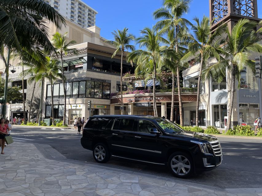 Oahu: Honolulu Airport Private by Escalade SUV - Finding Your Driver at Baggage Claim (That Sign Is Real Help)