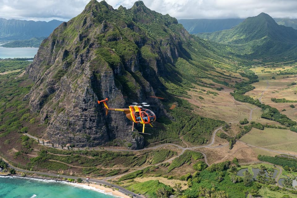 Oahu: Magnum P.I. Doors-Off Helicopter Tour - Sacred Falls and the North Shore: mountains meet ocean
