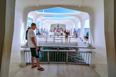Oahu: Pearl Harbor and Historic Honolulu Half Day - Waikīkī pickup in action: timing, texting, and the no-bag rule