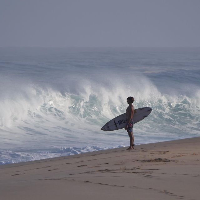 Oahu: Private Surfing Lesson with Local Big Wave Surfer - On the water at Waialua Bay: getting up with personalized feedback