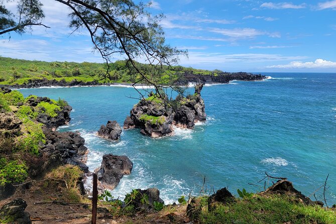 Road to Hana Rainforest, Black Sand Beach, Waterfalls & Lunch - Paia and Ho’okipa: the morning hits before the road gets intense